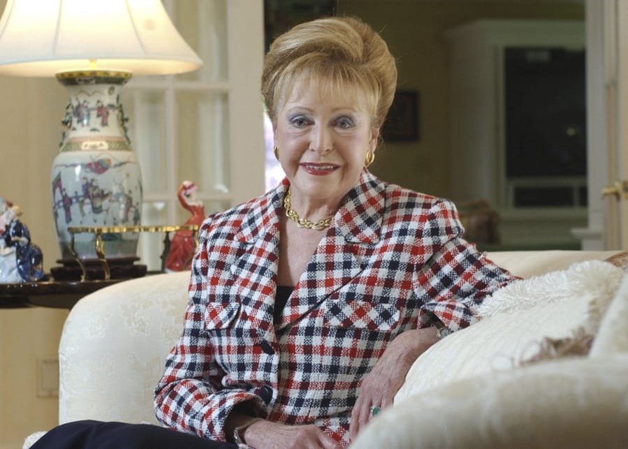 Author Mary Higgins Clark in June 2004 in her home in Saddle River, N.J. Clark, the tireless and long-reigning &quot;Queen of Suspense&quot; whose tales of women beating the odds made her one of the world&#039;s most popular writers, died Friday at age 92.