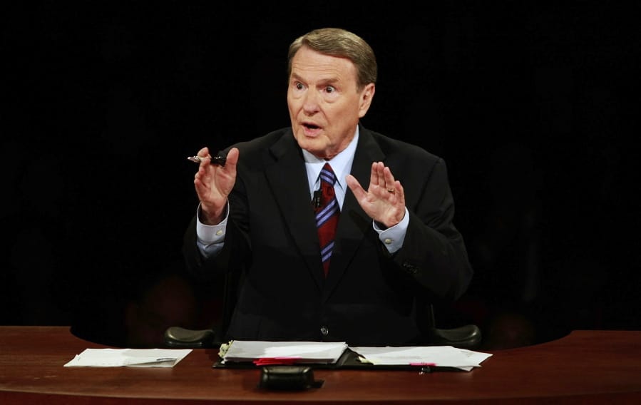 FILE - This Sept. 26, 2008 file photo shows debate moderator Jim Lehrer during the first U.S. Presidential Debate between presidential nominees Sen. John McCain, R-Ariz., and Sen. Barack Obama, D-Ill., at the University of Mississippi in Oxford, Miss.  PBS announced that PBS NewsHour&#039;s Jim Lehrer died Thursday, Jan. 23, 2020, at home. He was 85.