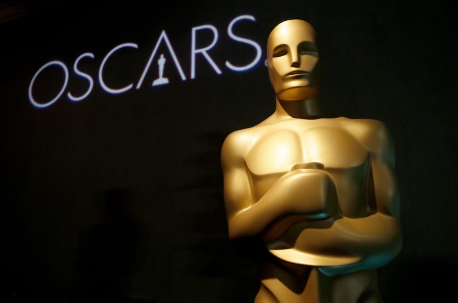 FILE - In this Feb. 4, 2019 file photo, an Oscar statue appears at the 91st Academy Awards Nominees Luncheon in Beverly Hills, Calif. The Oscars will not have a host for its annual awards show.