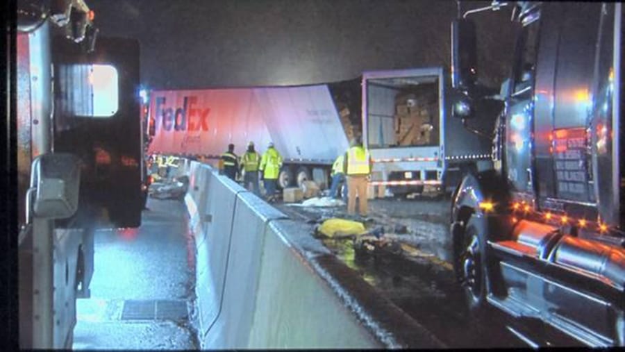 Emergency crews respond to a fatal crash on the Pennsylvania Turnpike in Mount Pleasant Township early Sunday morning. Multiple people were killed in the crash involving a passenger bus, two tractor-trailers and passenger vehicles, officials said.