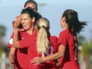Canada&#039;s Christine Sinclair, front left, celebrates with teammates after scoring against St. Kitts and Nevis during a CONCACAF women&#039;s Olympic qualifying soccer match Wednesday, Jan. 29, 2020, in Edinburg, Texas.