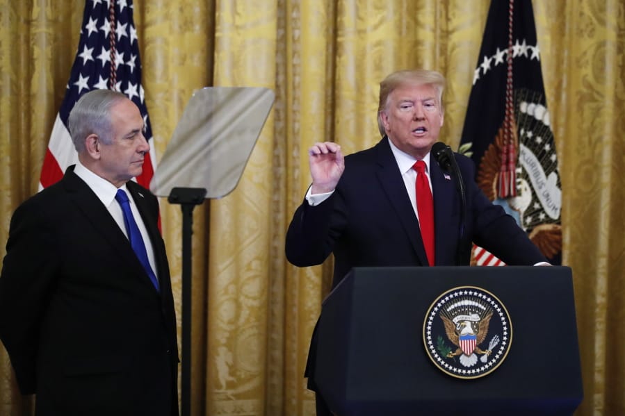 President Donald Trump, joined by Israeli Prime Minister Benjamin Netanyahu, speaks during an event in the East Room of the White House in Washington, Tuesday, Jan. 28, 2020, to announce the Trump administration&#039;s much-anticipated plan to resolve the Israeli-Palestinian conflict.
