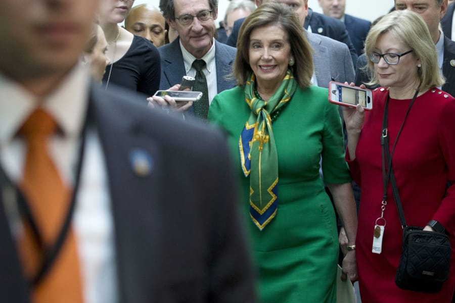 Speaker of the House Nancy Pelosi, D-Calif., leaves a meeting with the Democratic Caucus at the Capitol in Washington, Tuesday, Jan. 14, 2020.