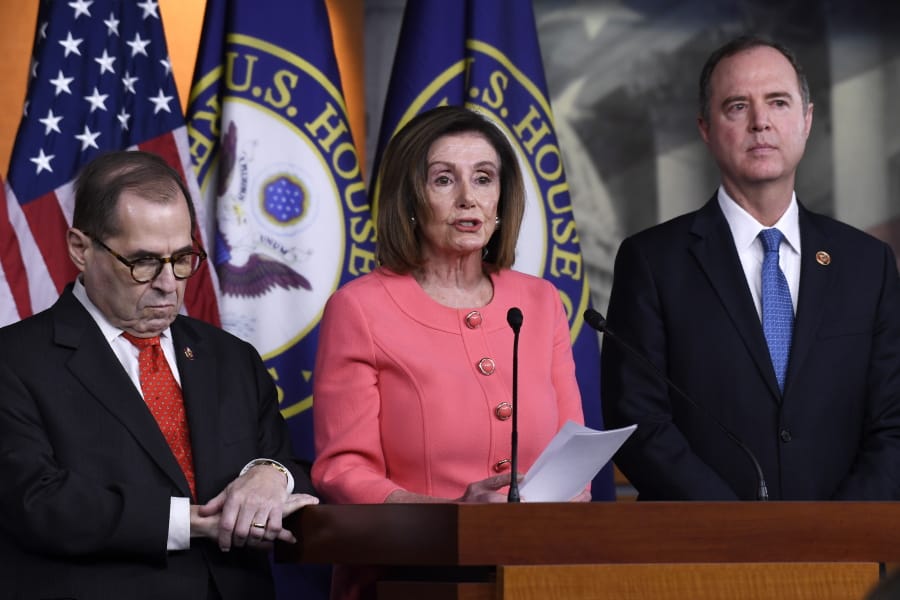 House Speaker Nancy Pelosi of Calif., center, flanked by House Judiciary Committee Chairman Rep. Jerrold Nadler, D-N.Y., left, and House Intelligence Committee Chairman Rep. Adam Schiff, D-Calif., speaks during a news conference to announce impeachment managers on Capitol Hill in Washington, Wednesday, Jan. 15, 2020. The U.S. House is set to vote Wednesday to send the articles of impeachment against President Donald Trump to the Senate for a landmark trial on whether the charges of abuse of power and obstruction of Congress are grounds for removal.
