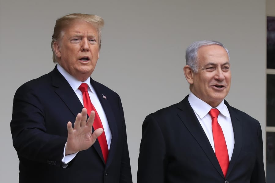 FILE - In this March 25, 2019, file photo, President Donald Trump welcomes visiting Israeli Prime Minister Benjamin Netanyahu to the White House in Washington. Trump is holding back-to-back meetings with Israeli Prime Minister Benjamin Netanyahu and his chief challenger ahead of the unveiling of the U.S. administration&#039;s much-anticipated plan to resolve the Israeli-Palestinian conflict. The meetings come just a month before Netanyahu and Benny Gantz are set to face off in national elections for the third time in less than a year.