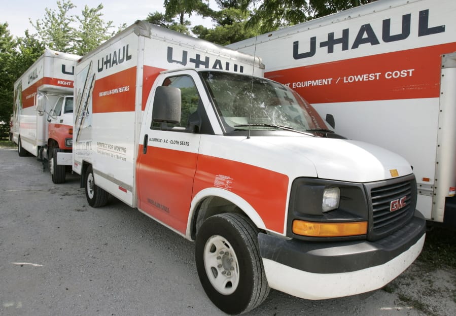 U-Haul trucks sit on a dealer lot in Des Moines, Iowa.