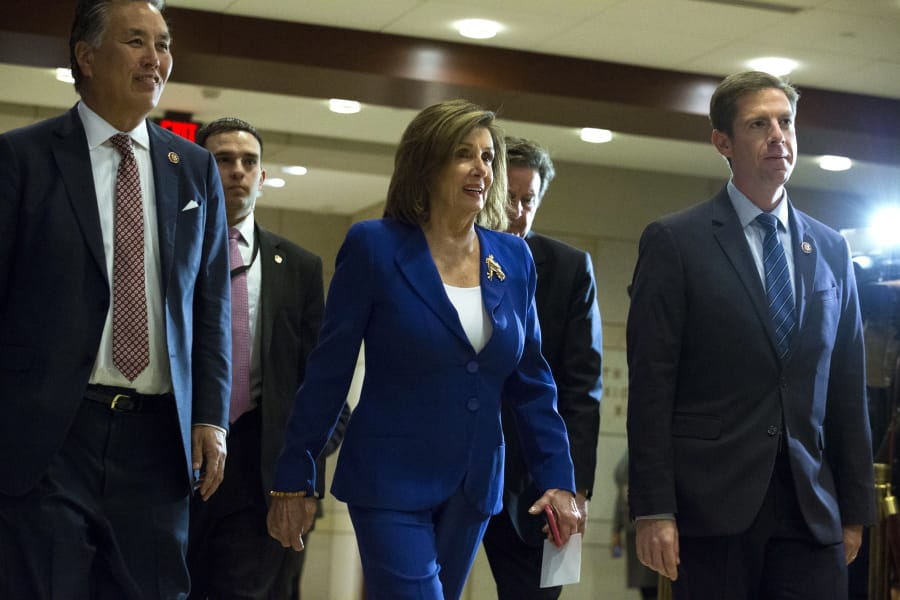Speaker of the House Nancy Pelosi, D-Calif., accompanied by members of the Congress arrive for a briefing on last week&#039;s targeted killing of Iran&#039;s senior military commander Gen. Qassem Soleimani on Capitol Hill, in Washington, Wednesday, Jan. 8, 2020.