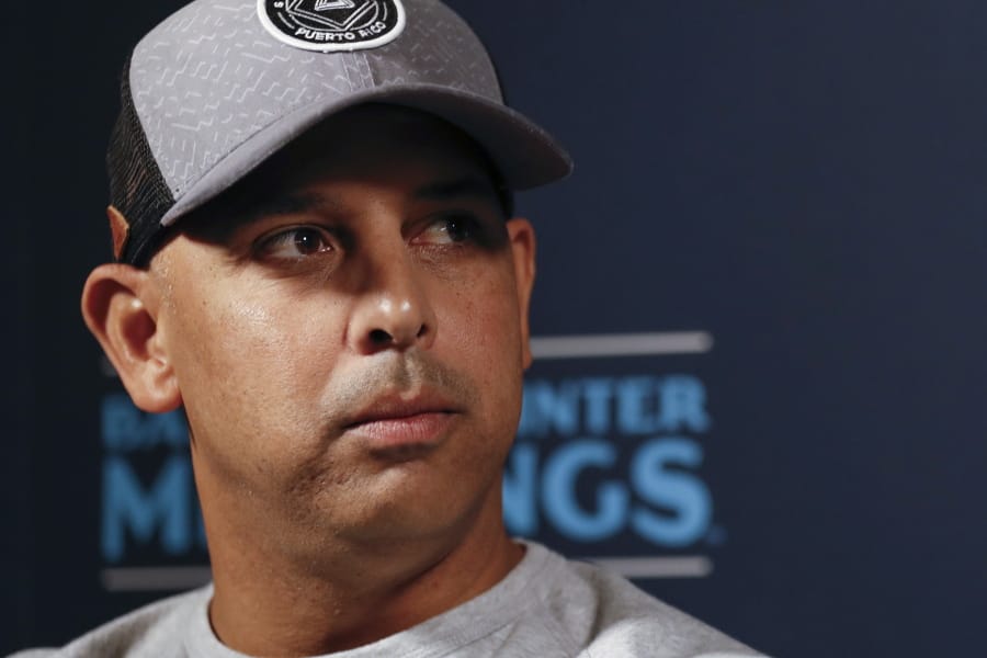 Boston Red Sox manager Alex Cora listens to a question during the Major League Baseball winter meetings Monday, Dec. 9, 2019, in San Diego.