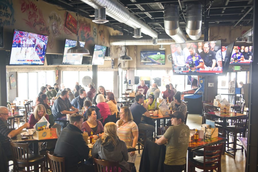 Hooligan&#039;s Sports Bar &amp; Grill has 50-plus TVs for Super Bowl watching.