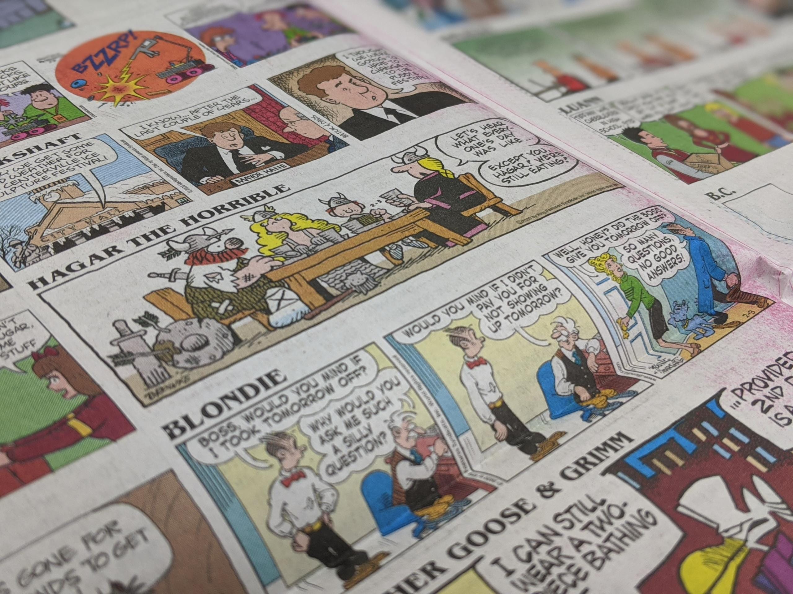 Two pages of comic strips run in the Tuesday paper.