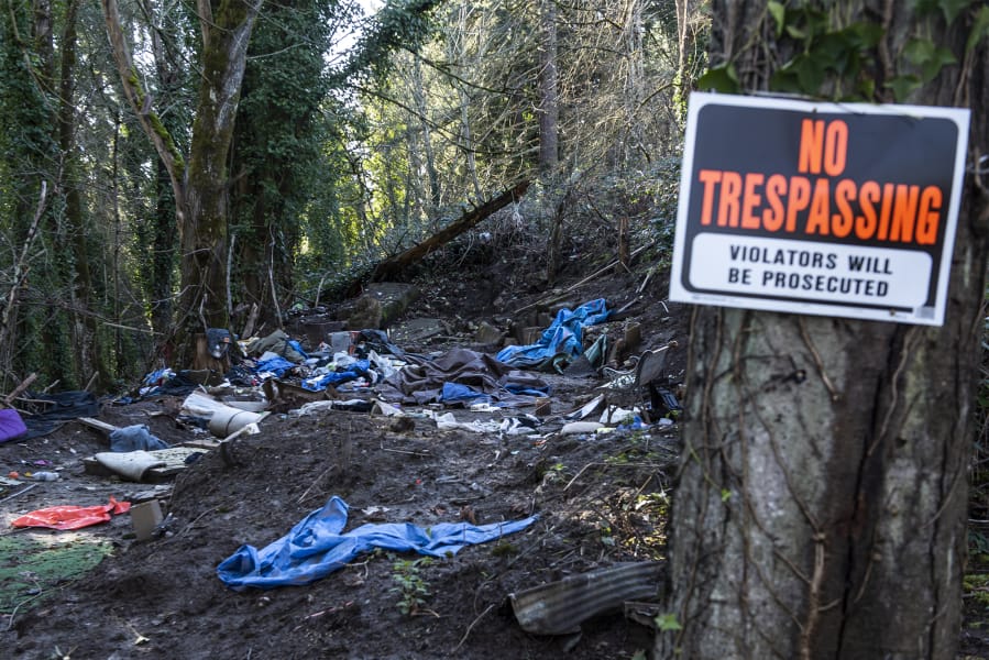 An abandoned campsite is seen Monday afternoon in the woods of north Hazel Dell.
