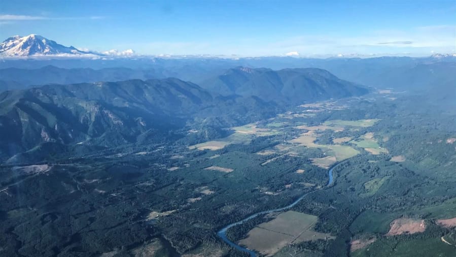 The Cowlitz River flows near Randle, where residents have opposed a plan by Crystal Geyser to build a water bottling plant along the river and pump 400 gallons a minute from nearby springs.