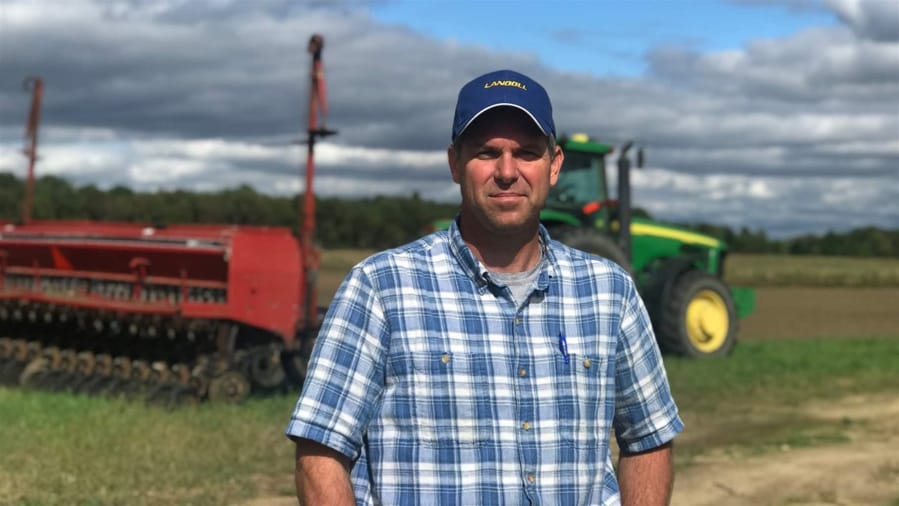 Joel Layman, an organic farmer in Berrien Center, Mich., says he and his peers have not been affected by the trade war as severely as farmers in conventional agriculture.