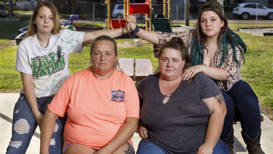 Trista Freeman, left, and Rose Reynolds, right, frantically contacted their mothers when their drunken school bus driver swerved across lanes and blew through red lights in Dayton, Tennessee, in November 2018. Lisa Freeman, front left, and Rana Reynolds are still angry their daughters were put at risk.