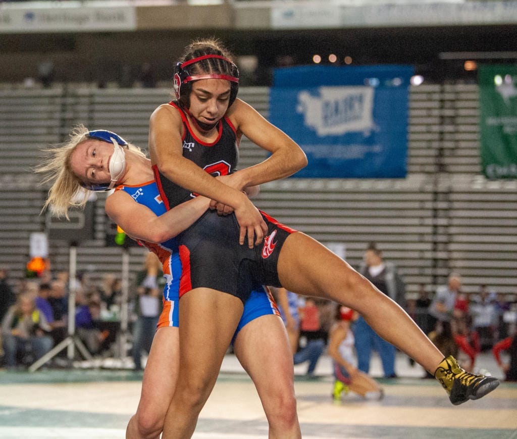 Ridgefield's Tyla Engstrom competes in a 110-pound quarterfinal matchup at Mat Classic XXXII on Friday at the Tacoma Dome.
