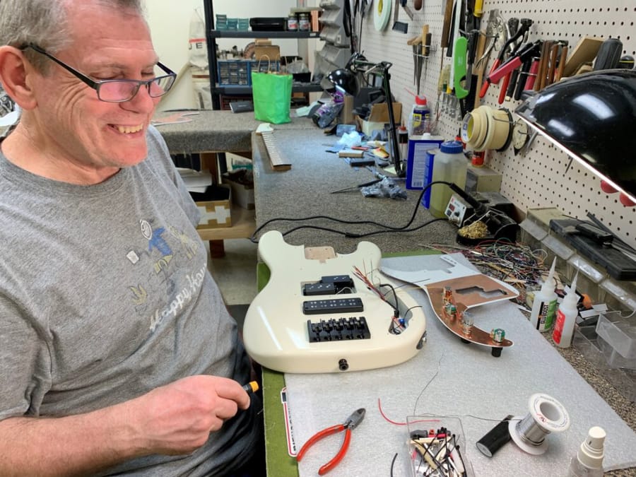 Mike Lull, the boss of bass guitars for bands like Heart, Cheap Trick and Pearl Jam, in his shop, Mike Lull Guitar Works. Lull died Feb. 12 after a brief battle with non-Hodgkins lymphoma, while he was healing from back surgery. He had just turned 66.