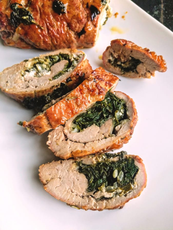 Pork loin stuffed with goat cheese and spinach is an elegant -- and easy -- weeknight meal.