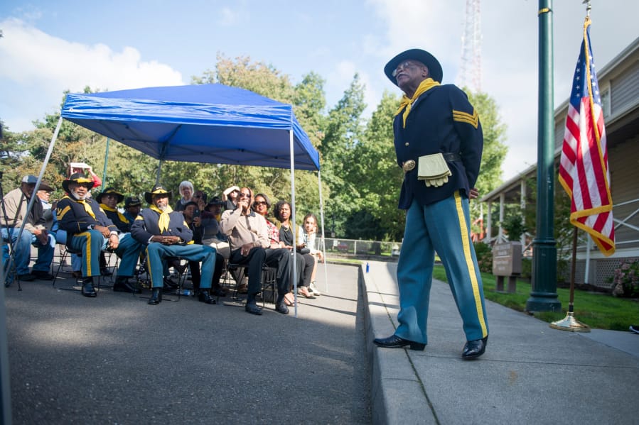 Frazier Raymond Jr., president of the Moses Williams Pacific Northwest Chapter of the Buffalo Soldiers, gets ready to speak at the 2019 dedication of a new Buffalo Soldiers memorial at Fort Vancouver.