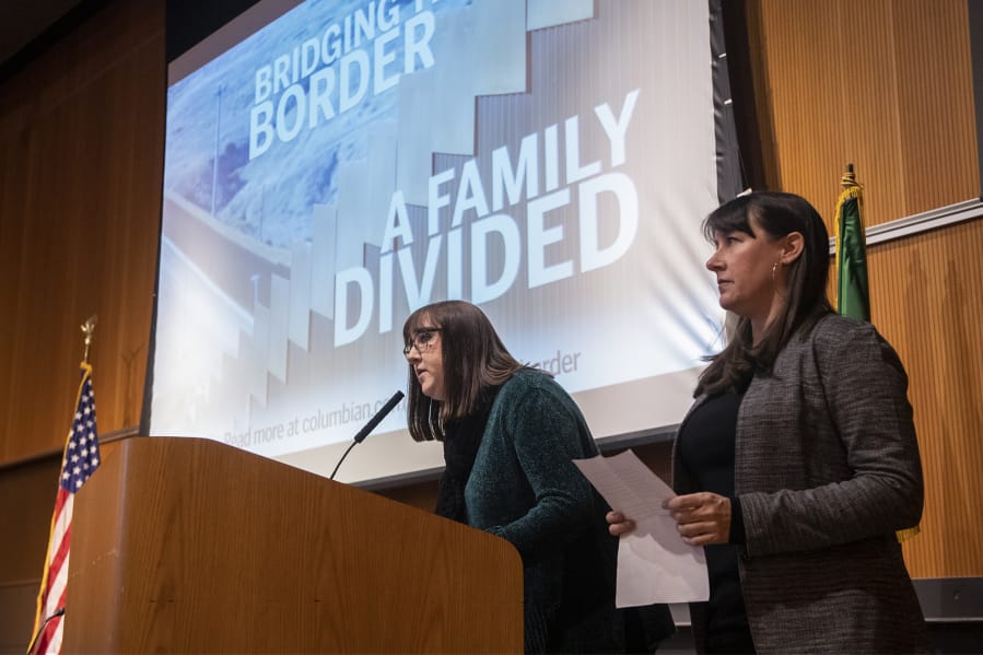 Nathan Howard/The Columbian
Assistant Metro Editor Jessica Prokop, left, and Photo Editor Amanda Cowan speak about their reporting of &quot;Bridging the Border.&quot;