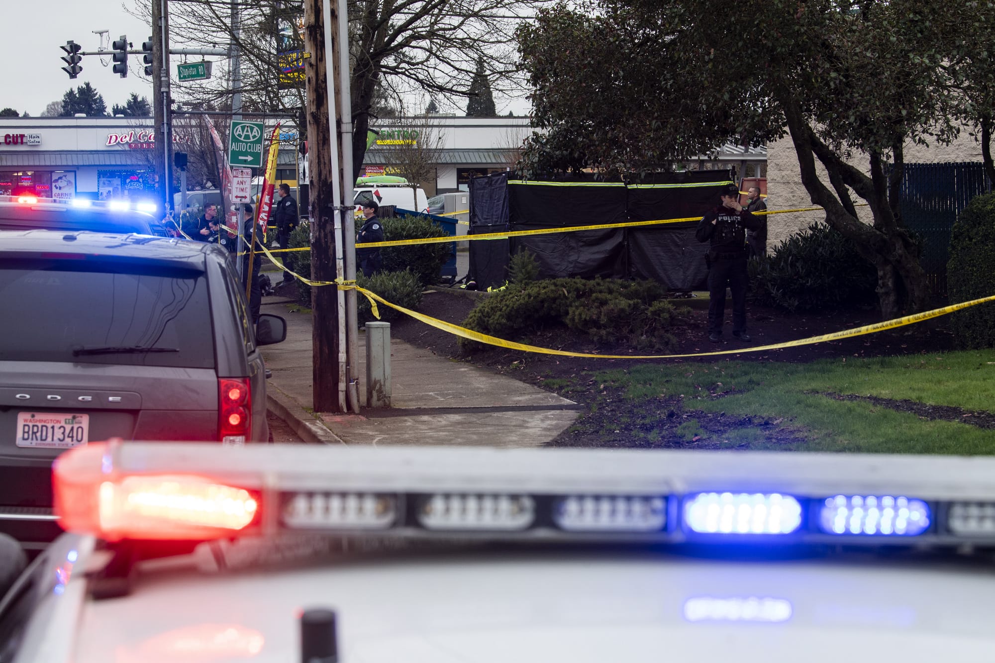 Vancouver police investigate a fatal shooting at Stapleton Road and Fourth Plain Boulevard in central Vancouver on Feb. 4, 2020. A young man was shot and killed. The victim's identity has not been released.
