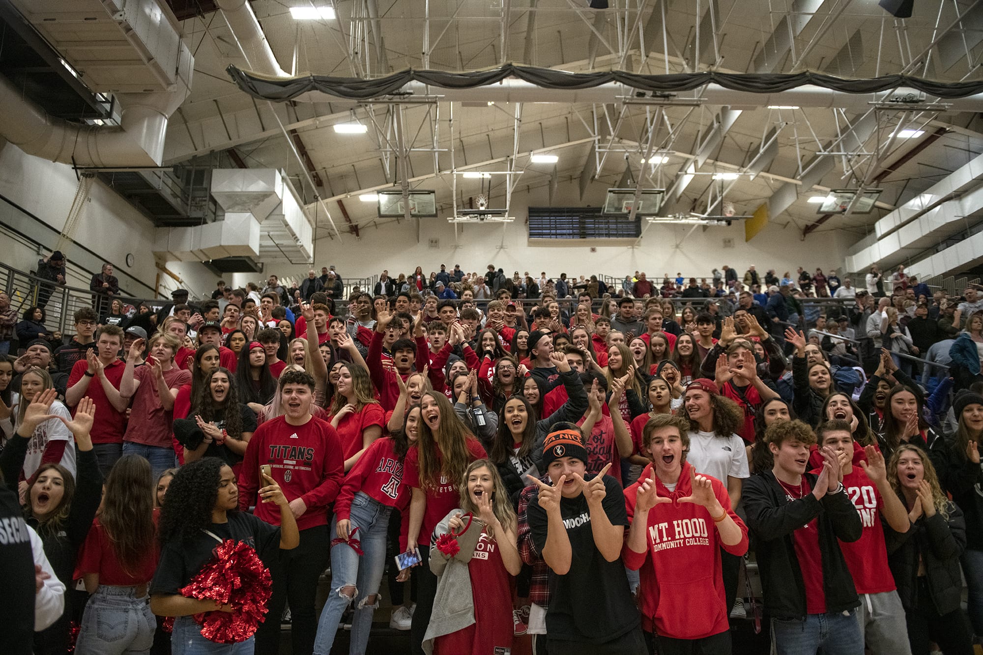 Union High School’s student section celebrates their team’s win over Gonzaga Prep at Battle Ground High School on Saturday evening, Feb. 29, 2020.