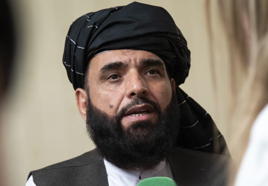 FILE - In this May 28, 2019 file photo, Suhail Shaheen, spokesman for the Taliban&#039;s political office in Doha, speaks to the media in Moscow, Russia.   The countdown to the signing of a peace agreement between the Taliban and the United States to end the 18 years of war in Afghanistan will begin on Friday night, when the seven-day &quot;reduction of violence&quot; promised by the Taliban will go into effect, a senior U.S. State Department official said. The deal will be signed on Feb. 29.