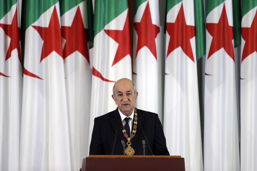 FILE- In this file photo dated Thursday, Dec. 19, 2019, Algerian president Abdelmadjid Tebboune delivers a speech during an inauguration ceremony in the presidential palace, in Algiers, Algeria.