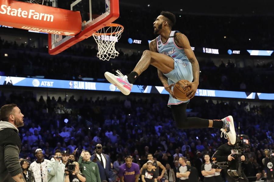 Miami Heat&#039;s Derrick Jones Jr. competes in the NBA All-Star slam dunk contest in Chicago, Saturday, Feb. 15, 2020. (AP Photo/Nam Y.