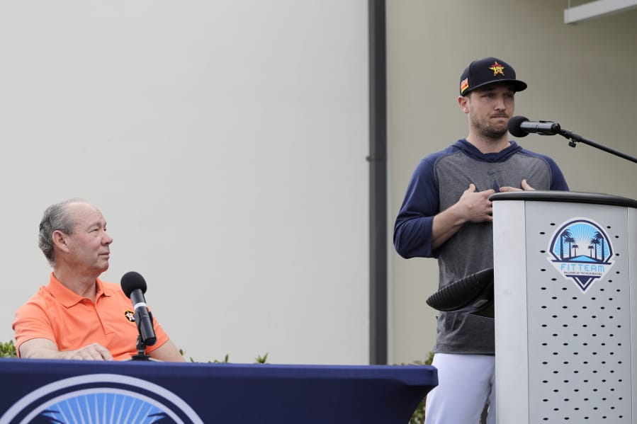 Houston Astros manager Dusty Baker, left, and owner Jim Crane speak during a news conference before the start of the first official spring training baseball practice for the team Thursday, Feb. 13, 2020, in West Palm Beach, Fla.