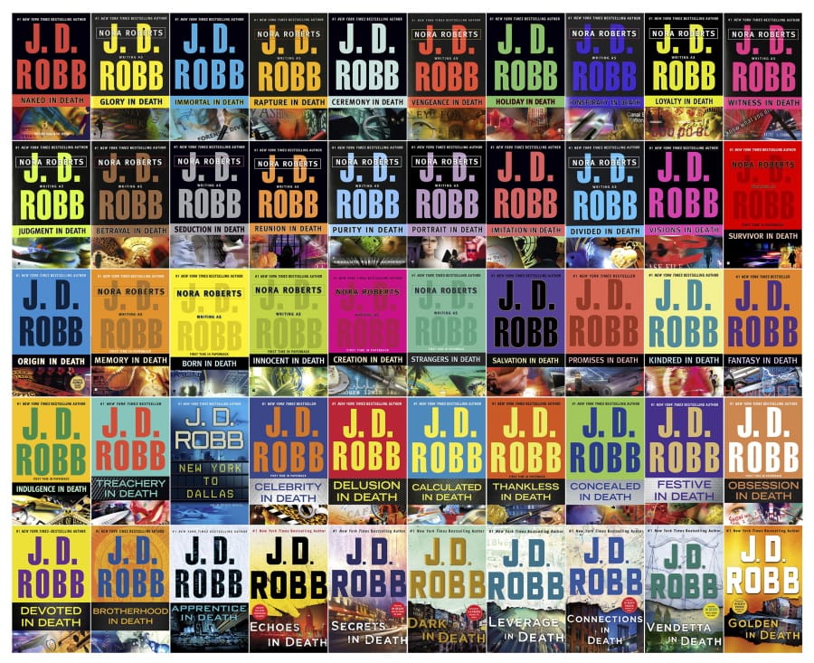 This combination of book cover images shows 50 volumes of the &quot;In Death&quot; crime series written by J.D. Robb, a pseudonym used by author Nora Roberts. Robb&#039;s latest book, &quot;Golden in Death,&quot; was released on Feb. 4. (Berkley/St.