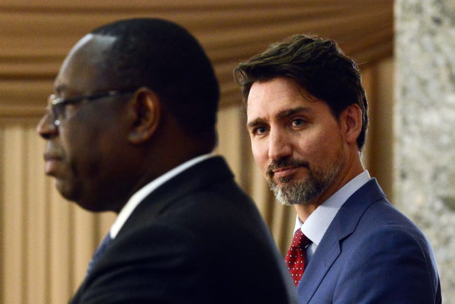 Canadian Prime Minister Justin Trudeau takes part in a joint press conference with President of Senegal Macky Sall at the Presidential Palace in Dakar, Senegal on Wednesday, Feb. 12, 2020.