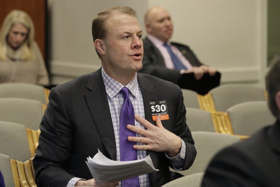 FILE - In this Feb. 4, 2020, file photo, initiative promoter Tim Eyman waits to speak during a hearing before the Washington State Senate Transportation Committee at the Capitol in Olympia, Wash., regarding proposed legislation surrounding I-976, an initiative passed by voters and promoted by Eyman in 2019 that would cut car tab registration fees to $30. A King County Superior Court judge on Wednesday, Feb. 12, 2020, has rejected most of a legal challenge to Eyman&#039;s measure, officials say would gut transportation budgets. (AP Photo/Ted S.