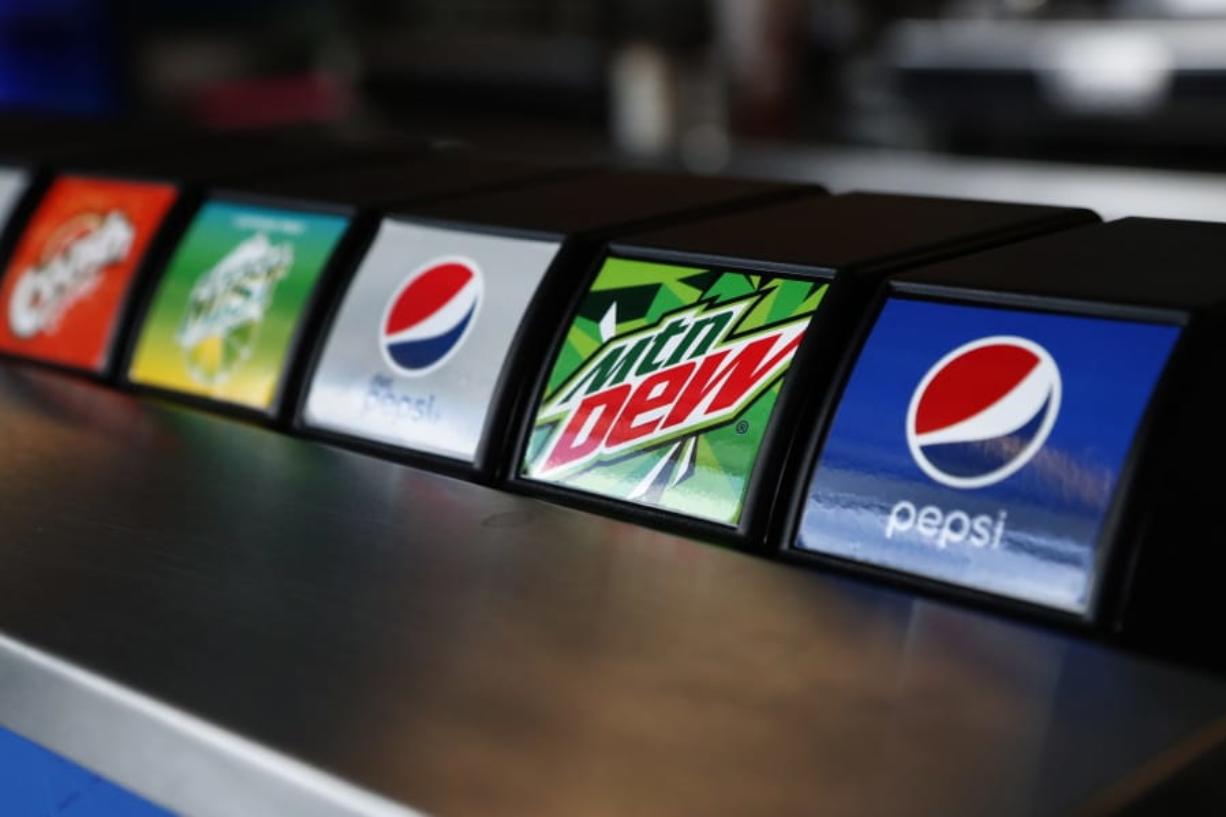 In this Sept. 14, 2019 photo, Pepsi products are shown at a concession stand at Hard Rock Stadium in Miami Gardens, Fla. PepsiCo Inc. reports financial results on Thursday, Feb. 13, 2020.