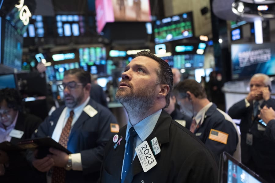 Stock trader Frank Masiello works at the New York Stock Exchange, Tuesday, Feb. 4, 2020. Stocks are opening broadly higher on Wall Street, following gains overseas.