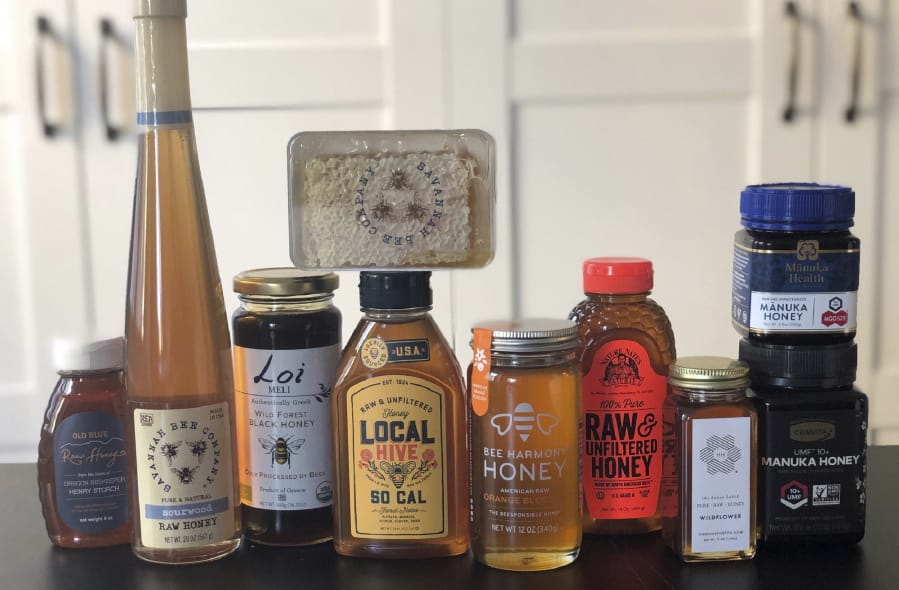 This February 24, 2020 photo taken in New York, shows some of the many brands and types of honey available today. Honey isn&#039;t just honey anymore. At farmers markets, grocery stores and restaurants, there&#039;s a wide assortment of honeys with various colors and tastes.