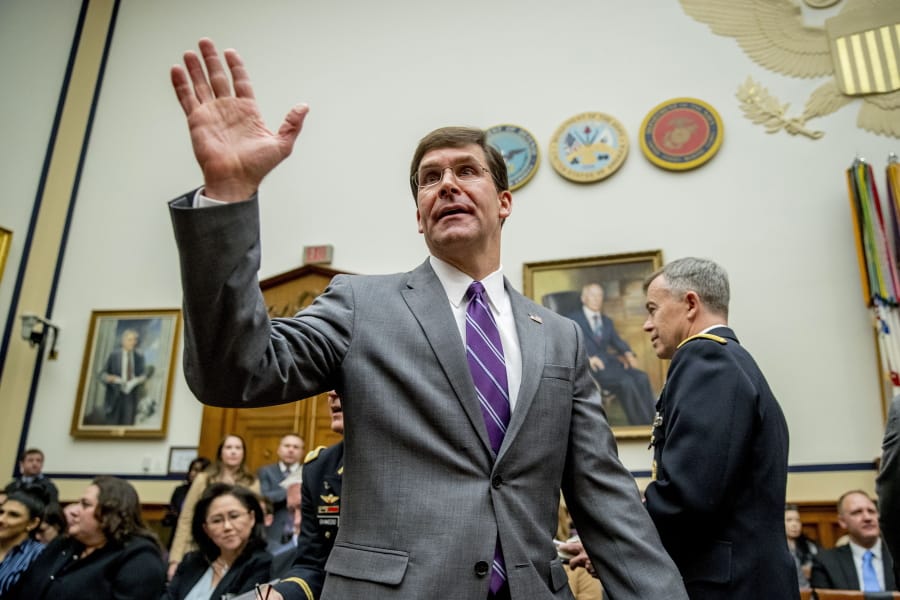 Defense Secretary Mark Esper arrives for a House Armed Services Committee hearing on Capitol Hill, Wednesday, Feb. 26, 2020, in Washington.