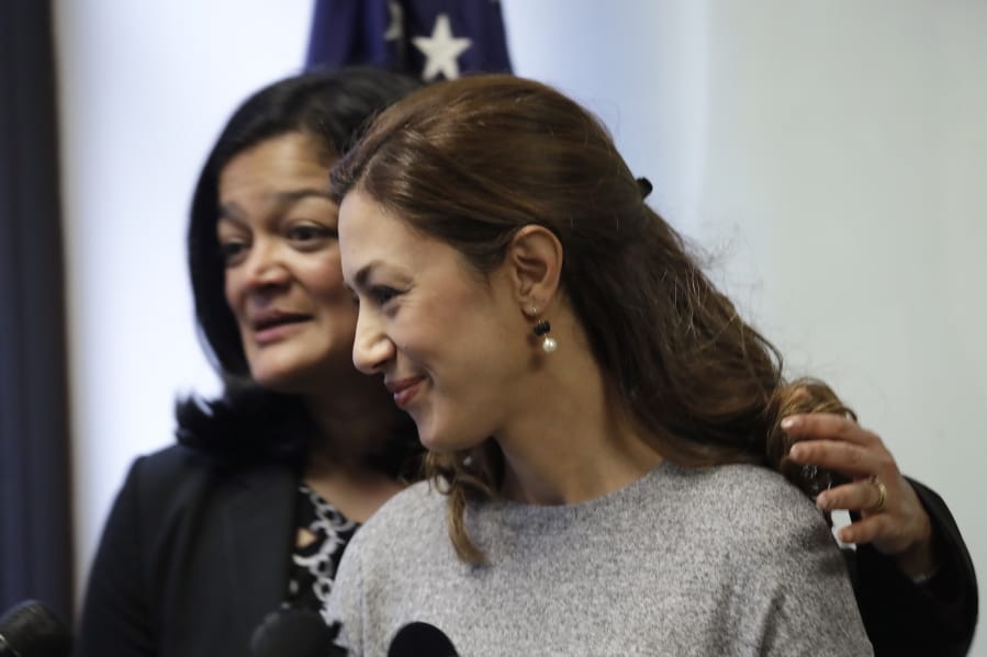 File - In this Jan 6, 2020, file photo, Rep. Pramila Jayapal, D-Wash., left, turns to Negah Hekmati after Hekmati spoke about her hours-long delay returning to the U.S. from Canada with her family days earlier, at a news conference in Seattle. U.S. Rep. Pramila Jayapal said Thursday, Jan. 30, she is working to authenticate an apparently leaked document showing that Customs and Border Protection agents on the U.S.-Canada border in Washington state were in fact ordered to detain Iranian and Iranian-American travelers early this month, despite initial agency denials.