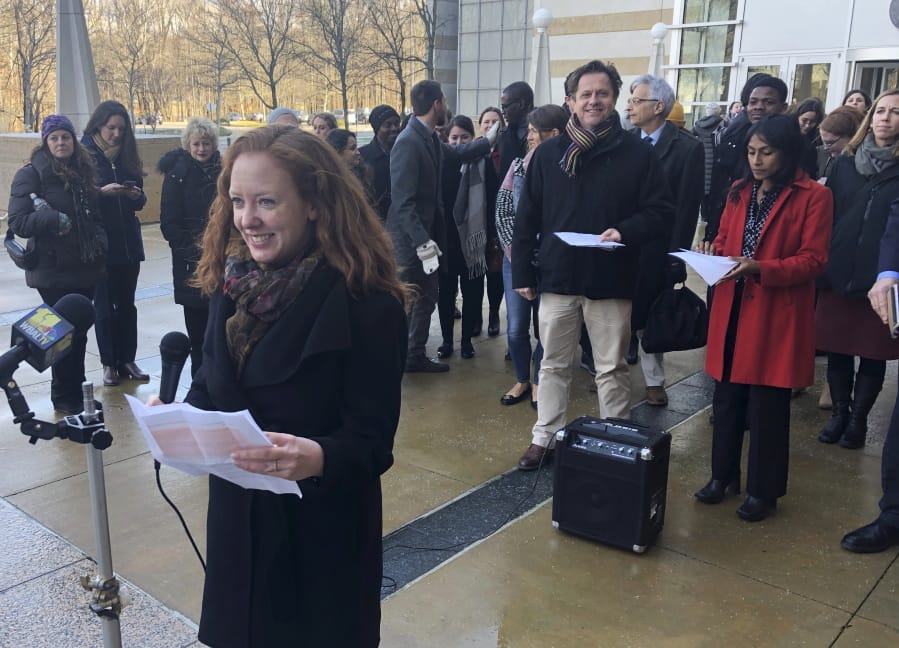FILE - In this Jan. 8, 2020, file photo, Linda Evarts, an attorney for the International Refugee Assistant Project, speaks to the media outside the federal courthouse in Greenbelt, Md.   The federal government is appealing a judge&#039;s decision to block the Trump administration from enforcing an executive order allowing state and local governments to turn away refugees from resettling in their jurisdictions. A notice of appeal filed Tuesday, Feb. 11,  by the Justice Department says it is asking the 4th U.S. Circuit Court of Appeals to review the Jan. 15 ruling by U.S.