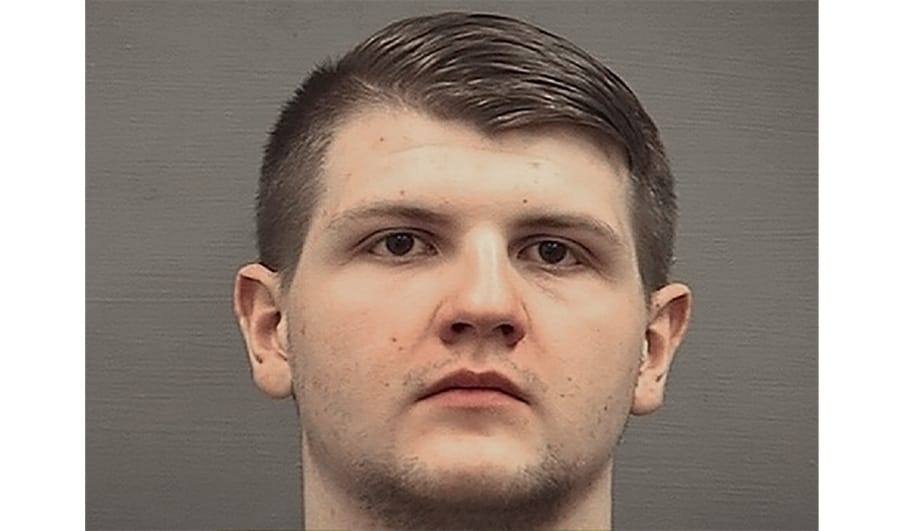 FILE - This file photo provided by the Alexandria Sheriff&#039;s Office, in Virginia, shows Andrew Thomasberg. Prosecutors are seeking an 18-month sentence for Thomasberg, an alleged neo-Nazi from northern Virginia, who pleaded guilty in 2019 to weapons violations.