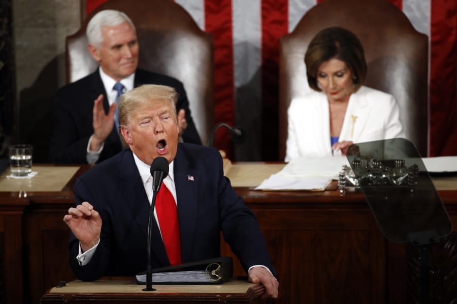 President Donald Trump delivers his State of the Union address to a joint session of Congress on Capitol Hill in Washington, Tuesday, Feb. 4, 2020, as Vice President Mike Pence ad House Speaker Nancy Pelosi of Calif., listen.