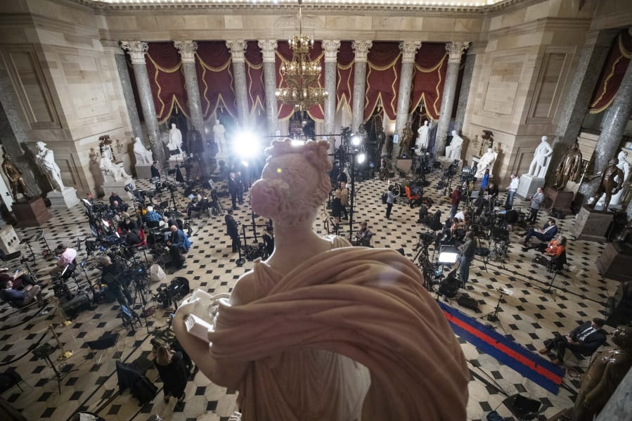 Statuary Hall, near the House floor, is set up for news media for the State of the Union address by President Donald Trump, on Capitol Hill, Tuesday, Feb. 4, 2020 in Washington.