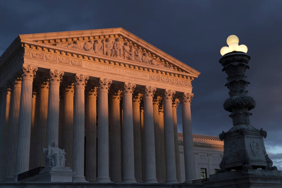 FILE - In this Jan. 24, 2019 file photo, the Supreme Court is seen at sunset in Washington. The Supreme Court is ruling 5-4 to close the courthouse door on the parents of a Mexican teenager who was shot dead over the border by an American agent. The court&#039;s five conservative justices ruled Tuesday that the parents could not sue Border Patrol Agent Jesus Mesa Jr., who killed their unarmed 15-year-old son in 2010.  (AP Photo/J.