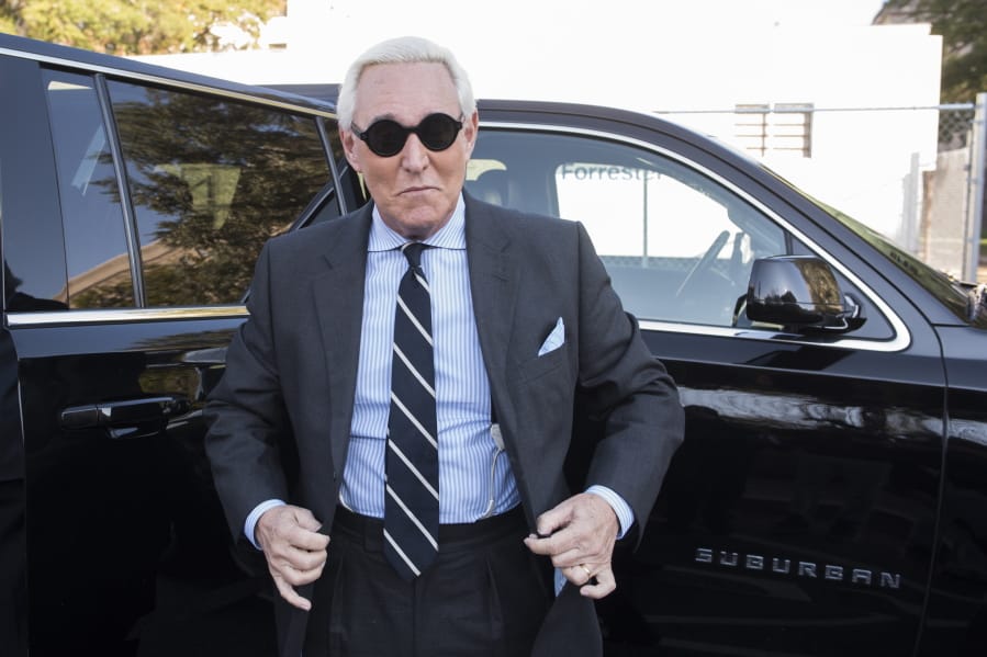 FILE - In this Nov. 6, 2019 file photo, Roger Stone arrives at Federal Court for the second day of jury selection for his federal trial, in Washington.