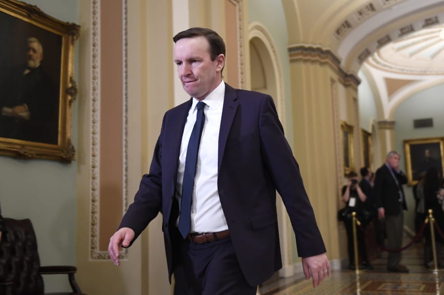 FILE - In this Feb. 3, 2020, file photo, Sen. Chris Murphy, D-Conn., walks on Capitol Hill in Washington, Murphy is defending a weekend meeting he held with Iran&#039;s foreign minister in Europe. The Connecticut Democrat said Tuesday his meeting with Mohammed Javad Zarif was important because it is dangerous not to talk to one&#039;s enemies.