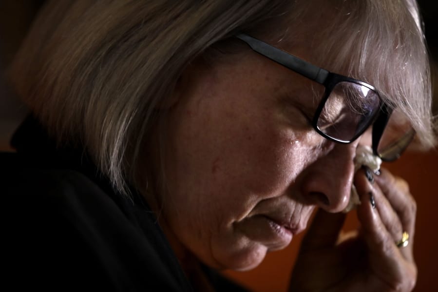 In this picture taken on Friday, Jan. 31, 2020 Yolanda Martinez Garcia cries during an interview with the Associated Press at her home, in Milan. Her son was sexually abused by one of the priests of the Legion of Christ, a disgraced religious order.