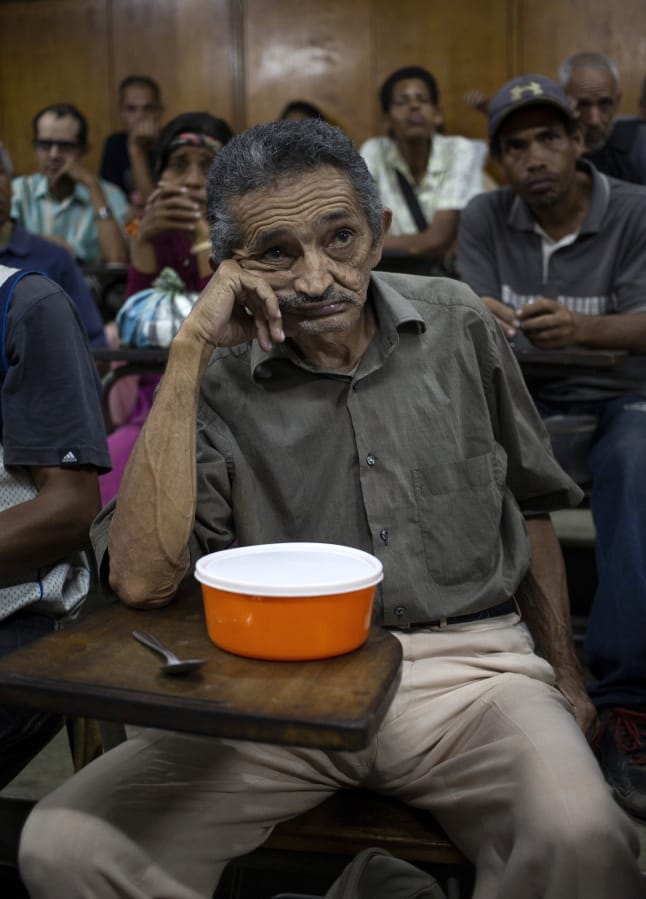 Orlando Blanco, 68, waits for food to be served Thursday at a religion center in The Cemetery slum in Caracas, Venezuela. A study by the U.N. World Food Program found that one in three Venezuelans copes with food insecurity.