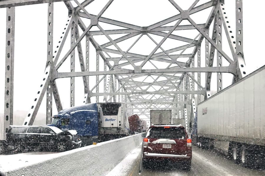 In this photo released by the Missouri State Highway Patrol, a multi-vehicle pileup on Interstate 70 on the bridge that spans the Missouri River near Rocheport, Mo., is shown during a winter storm, Wednesday, Feb. 5, 2020.