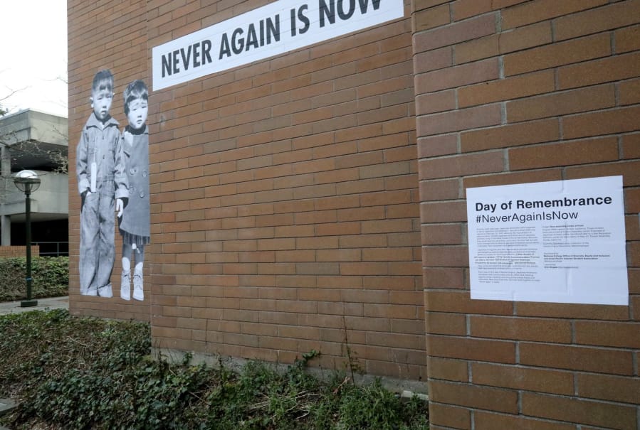 An art installation by Seattle artist Erin Shigaki, placed on a Bellevue College building, depicts two Japanese American children who were incarcerated by the U.S. government during World War II.