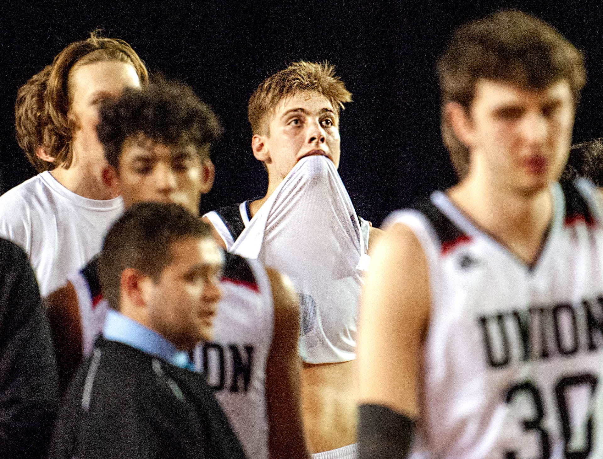 Union's Tanner Toolson stares at the scoreboard after the Titans' 63-55 defeat to Central Valley in the 4A State semifinal on Friday at the Tacoma Dome.