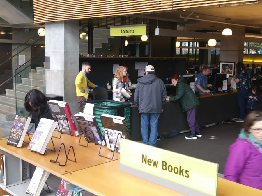 Patrons scoured the Vancouver Community Library on Saturday for weeks&#039; worth of materials to take home before the library closed for two weeks. &quot;It was crazy, crazy,&quot; said library access manager Brian Hulsey, in yellow.